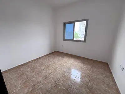 شقة غرفتين وصالة للإيجار الراشدية 2 عجمان قرب الكورنيش 35 ألف