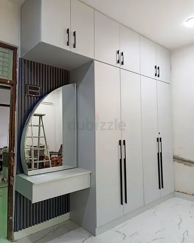 My built-in wardrobe with vanity and overhead cabinets — good condition