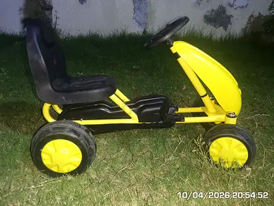 Red kids pedal go-kart (age 2-4) — pickup in Al Ain