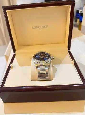 Longines men’s watch with tag