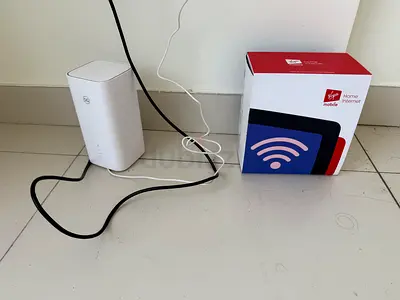 Virgin Mobile Home Internet Router (with original box) and adaptor for 9 months- already paid - WiFi