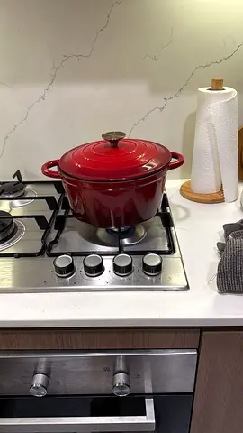Red enameled cast-iron Dutch oven (used)