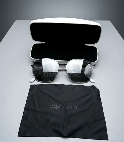 Calvin Klein  (ck) original sunglass silver Colour very light weight