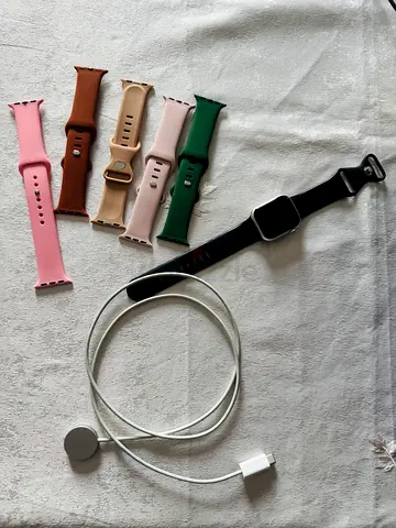 Apple smartwatch with magnetic charger and 5 silicone bands