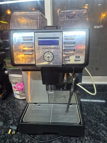 My Nuova Simonelli automatic espresso  cappuccino machine (used)