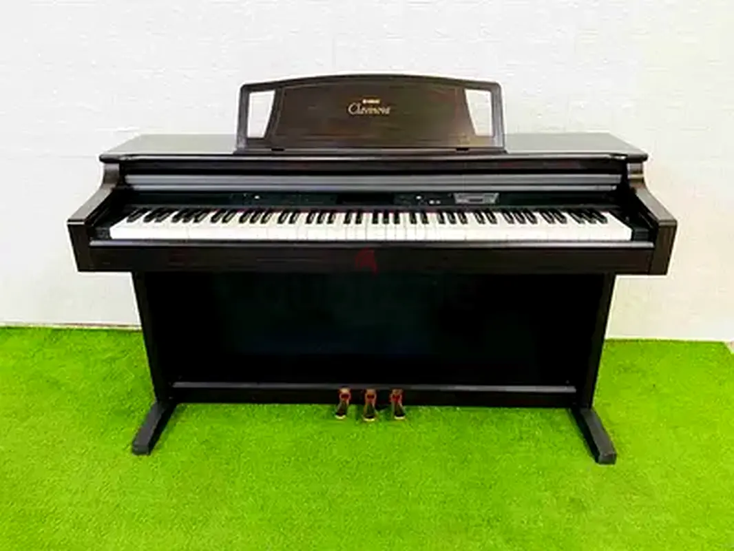 Yamaha Clavinova CLP711 Piano. Japan made in perfect working. Cash 