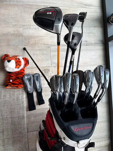 My complete golf club set with TaylorMade stand bag — driver, irons, wedges, hybrids and putter