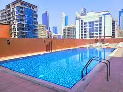 Lavish 2bhk with 2 Balcony gym pool parking free near to Metro station