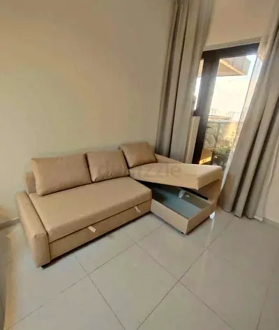 Ikea L Shape Sofa cum bed with big storage in L