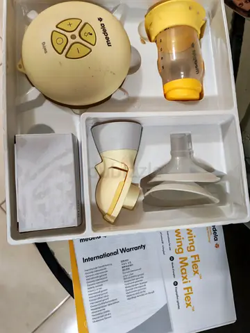 Used Medela Swing Flex electric breast pump - complete set with parts