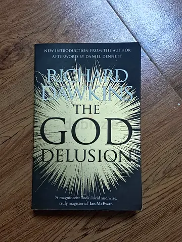 The $% Delusion by Richard Dawkins — Paperback