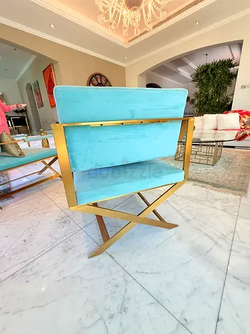 My aqua velvet accent chair with gold X-frame
