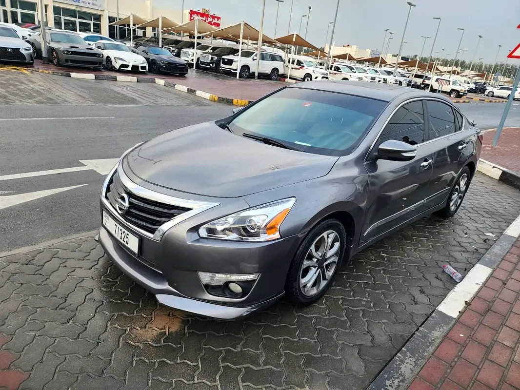 Nissan Altima 2014 — photo 1 of 14