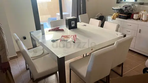 Dinning table 8 chairs and cabinet