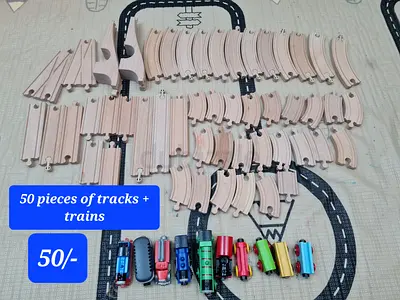 Wooden train tracks with train