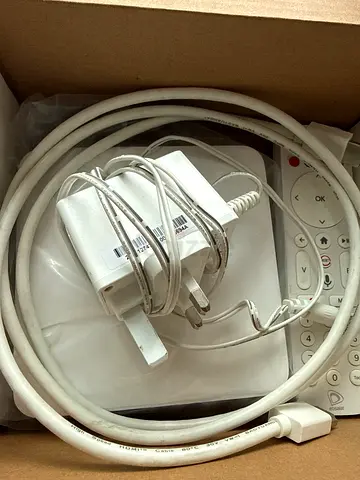 Tv Receiver box Used white chargers and cables with remote — sold as-is