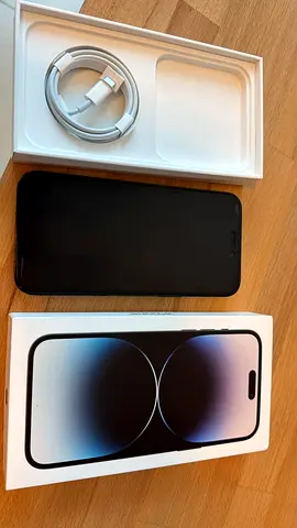 iPhone 14 Pro — used, comes with original box and Lightning cable, extra cable and cover