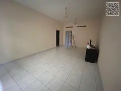 Modern Two Bedroom Apartment with Spacious Living Room Two Bathrooms Balcony and Central AC in a Pri