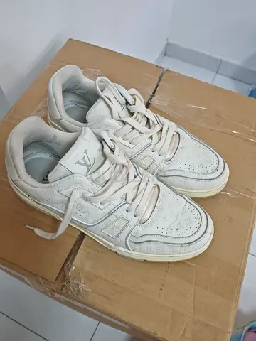 My white Louis Vuitton sneakers — gently used, some wear