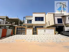 For sale, a luxurious villa in Al Yasmeen, Ajman, 5 master bedrooms, a living room, a hall, and a ma