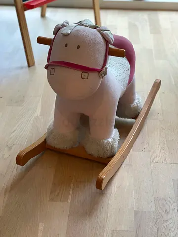 Plush pink toddler rocking horse/unicorn