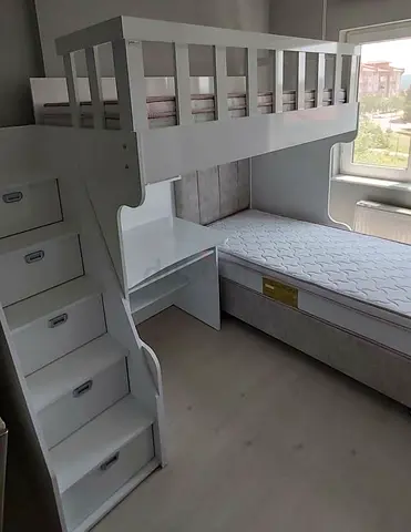 Bunk bed with storage stairs and built-in desk