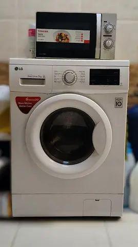 LG 7kg Front Load Washing Machine — AED 650