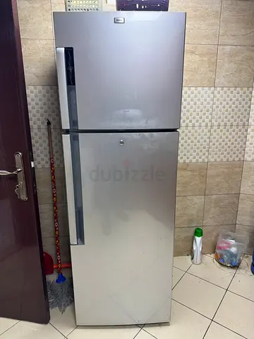 Double-door silver refrigerator - working condition