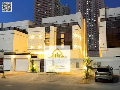 Luxury villa for sale, two floors and a rooftop with a swimming pool, including electricity, water and air conditioning.