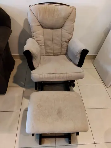 Rocking chair Beige upholstered reclining chair with matching footstool