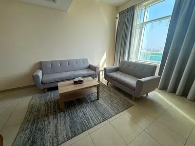 Light grey sofa set (3-seater + 2-seater) with coffee table