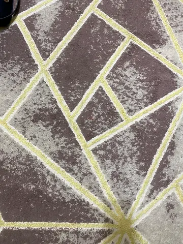 My modern geometric area rug — grey/brown with cream lines
