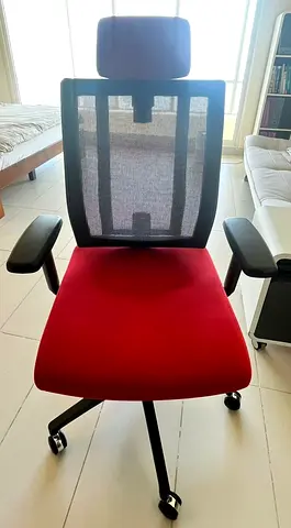 Red Office Chair by PROMAX with adjustable armrests and headrest