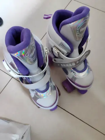 Adjustable purple  white inline skates- perfect condition. for kids