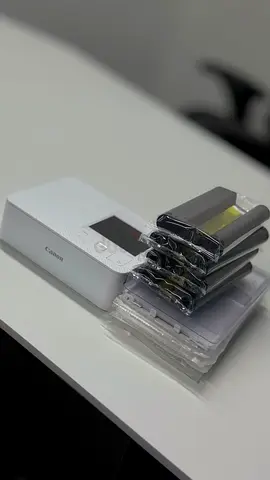 Canon Selphy Photo Printer + Ink  Paper Bundle (150+ Prints)