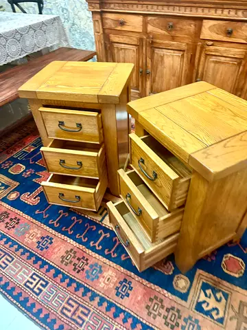 Pair of solid wood bedside tables — 3 drawers each from Marina