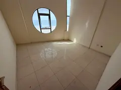 Three bedrooms and a living room - annual rent - Ajman Corniche - central air conditioning - mainten