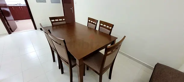 My 6-seater solid wood dining table and chairs - good condition