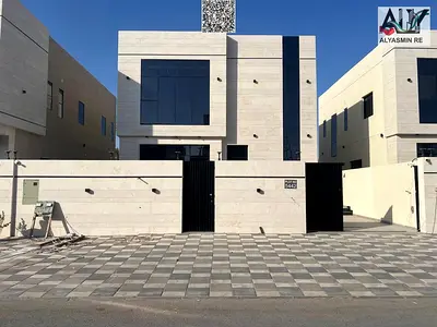 Villa with all registration and ownership fees included, on the main street, ready to move in, in one of the most prestigious areas of Ajman, freehold