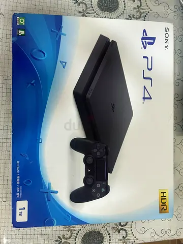 PS4 Slim 1TB with 2 DualShock 4 controllers - Perfect Condition