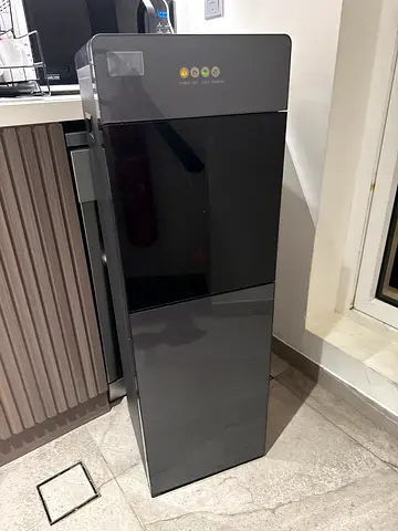 Black Standing Water Dispenser / Cooler - Good Condition. Less than 2 years old