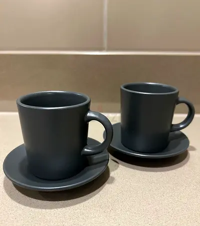 Set of Two Stylish IKEA Gray Coffee Cups with Saucers