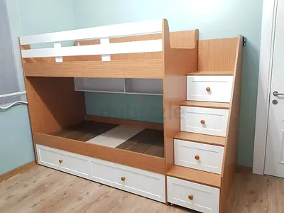 Wooden bunk bed with stair storage and under-drawers