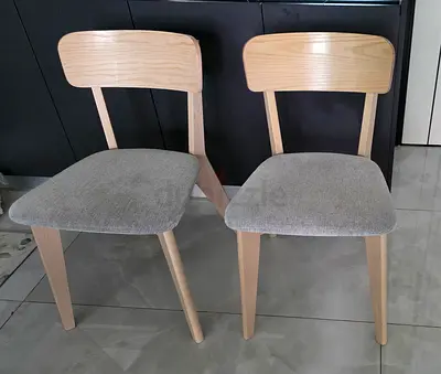 IKEA Set of 2 light-wood dining chairs with grey upholstered seats