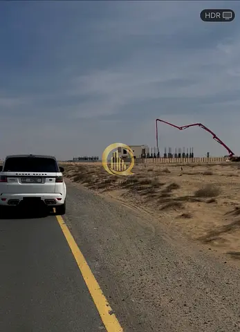 ارض تجارية للبيع في امارة الشارقة مشروع  روضة القرط  موقع فنان وممتاز جدا زاوية على شارعين 97 متر و 152 متر