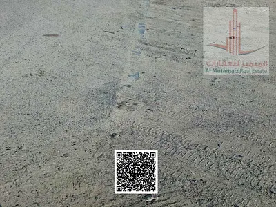 Opportunity for investors: 4 plots of land for sale in Ajman, Al Manama, Block 8. The plots are adjacent, each measuring 400 square meters (4305 squar
