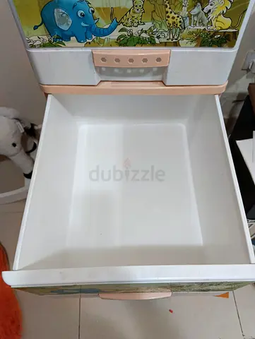 Used jungle-print baby dresser — clean sturdy drawer