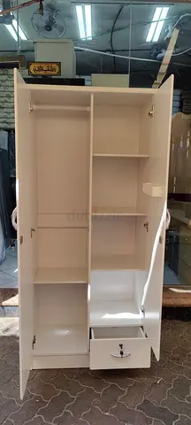 White wardrobe/armoire with shelves, hanging rail and drawer - good quality