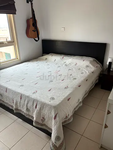 Double bed frame with headboard and matching side tables