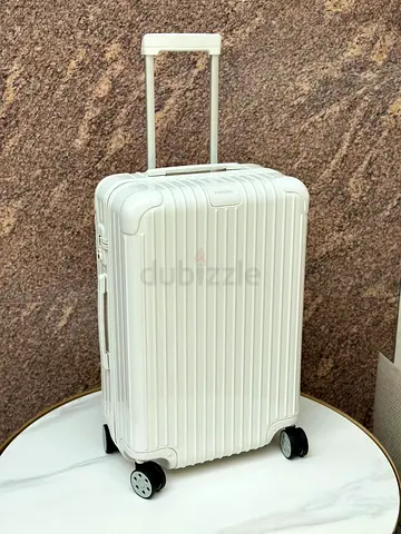white Rimowa Essential Cabin suitcase